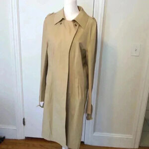 Barney’s New York tan rain coat. Button and snap close.